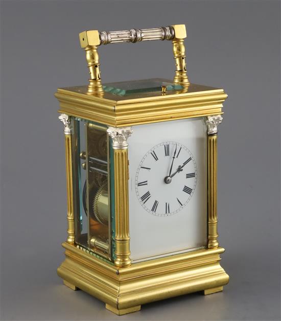 An early 20th century French gilt brass quarter-repeating carriage clock, H.7in.